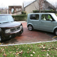 Image for article titled Nissan Cubes in NYC with CA Plates